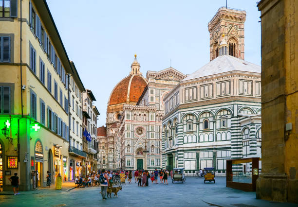 an evening view of the cathedral of santa maria del fiore in florence - rose window florence italy cathedral tuscany imagens e fotografias de stock