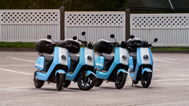 istock A row of four scooters for tourist rent. 1266804327