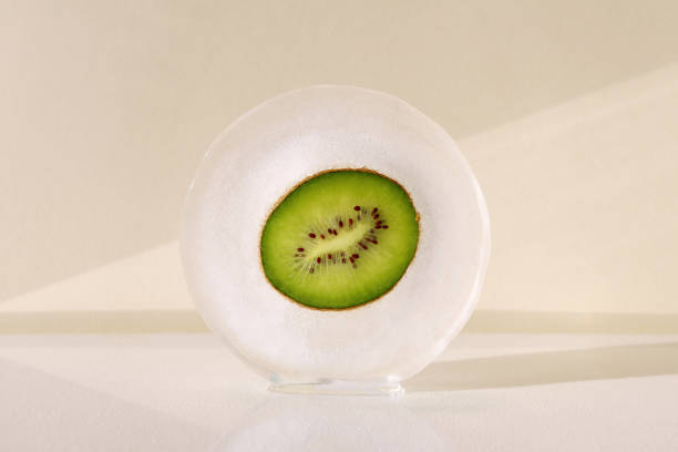 Kiwi in round ice. Horizontal poster with central composition