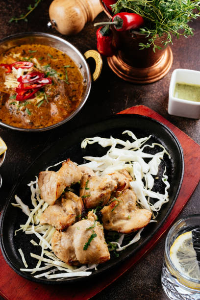 istock Indian food on a dark background 1266809991