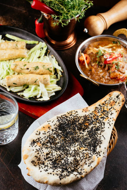 istock Indian food on a dark background 1266810003