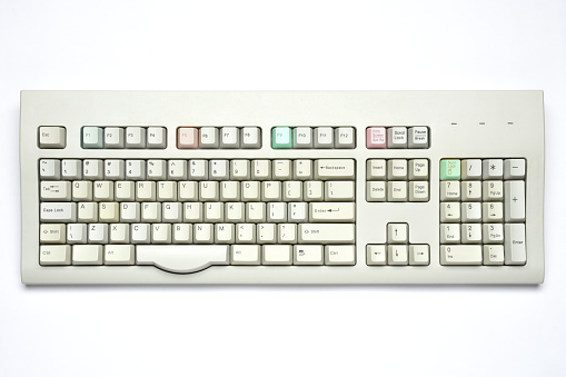 Old fashioned clean desktop computer keyboard on the white background (Clipping Path)