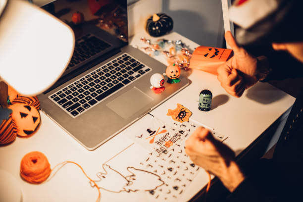 istock A man prepares a decoration for Halloween 1266811915