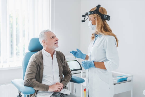 istock Woman otolaryngologist discussing with her patient problems who visiting clinic 1266812302