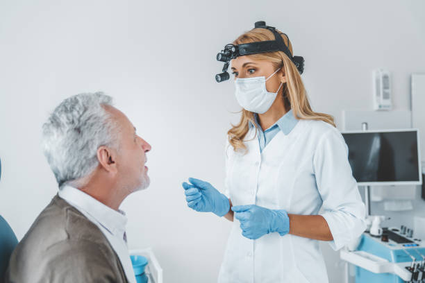 istock Senior man visiting otolaryngologist in clinic 1266812329