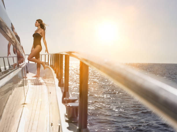 istock Woman on Deck of Boat 1266814410
