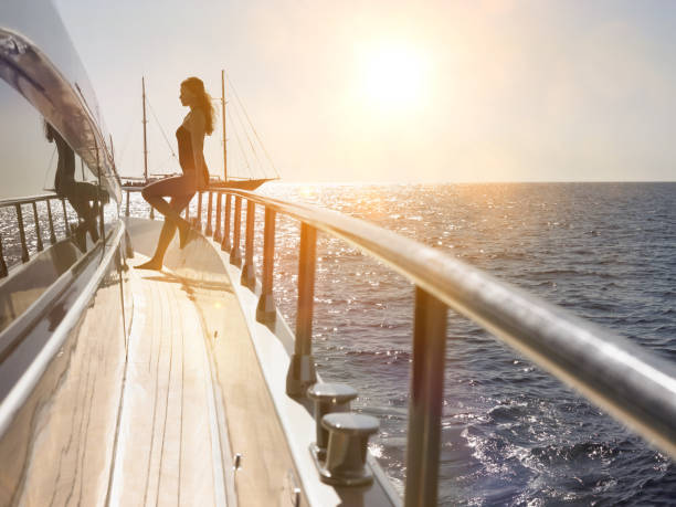 istock Woman on Deck of Boat 1266814472