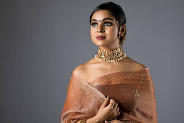 istock Beautiful Indian woman in sari 1266816227