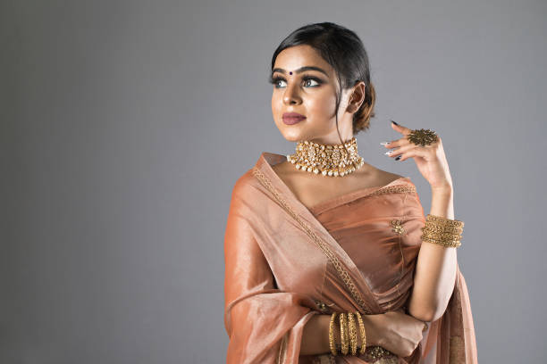 istock Beautiful Indian woman in sari 1266816335
