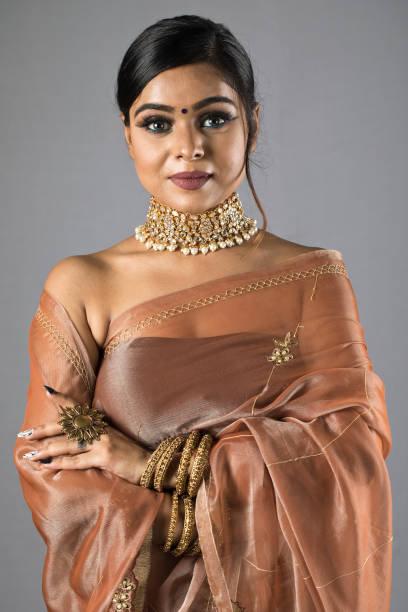 istock Beautiful Indian woman in sari 1266816450
