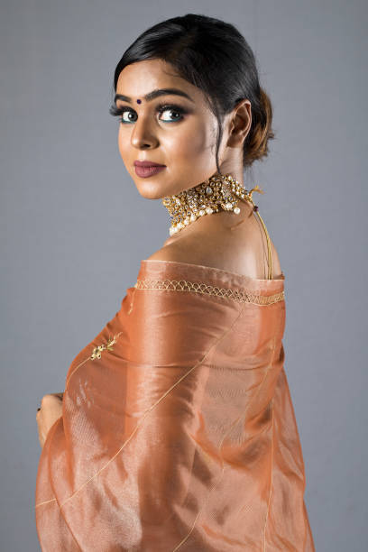 istock Beautiful Indian woman in sari 1266816471