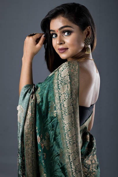 istock Beautiful Indian woman in sari 1266817765