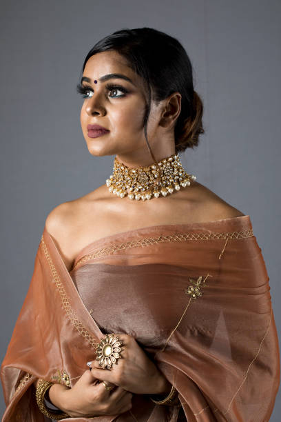istock Beautiful Indian woman in sari 1266817839