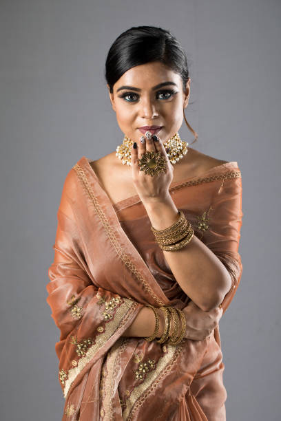 istock Beautiful woman greeting 1266817891