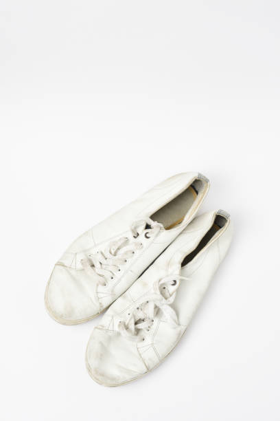 dirty sneakers isolated on a white background