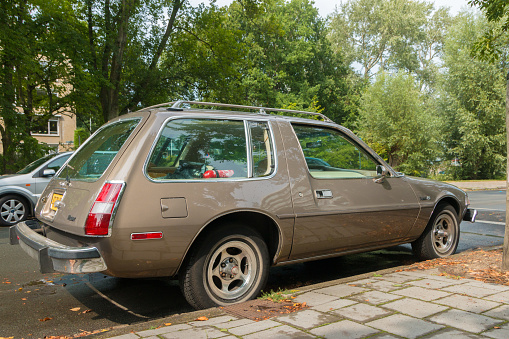 The Hague, the Netherlands - August 17 2020: modern classic AMC pacer car parked on a pleasant city street