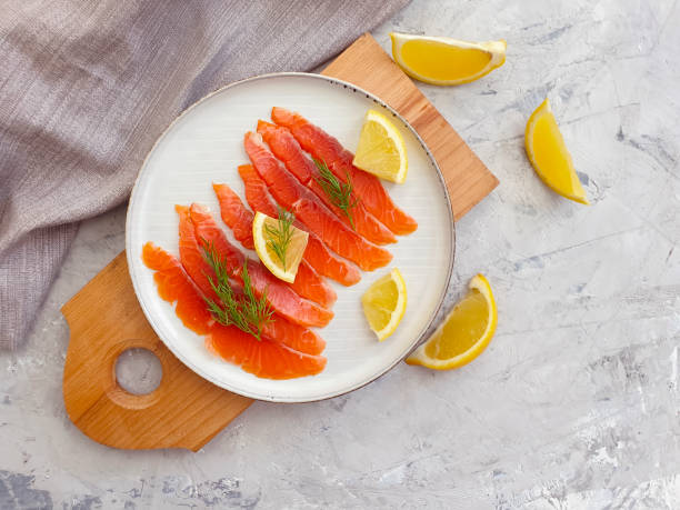 istock red fish slices on concrete background 1266832239