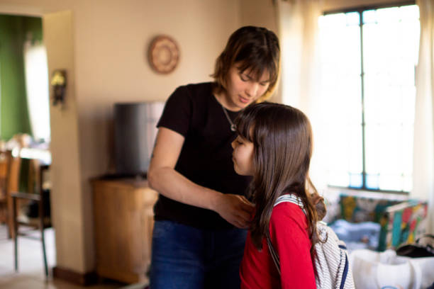 istock mother with her daughter before going to school 1266832414