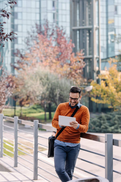 istock Businessman Using a Digital Tablet PC on the Street 1266833887