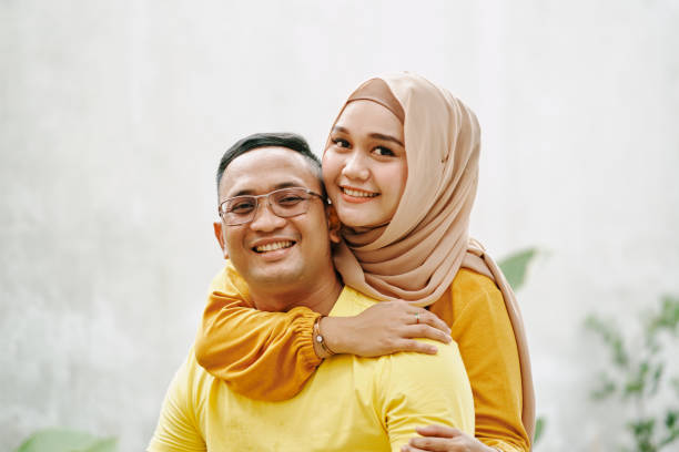 Portrait of Beautiful Islam Couple Through a Child's Eye happy malay couple stock pictures, royalty-free photos & images