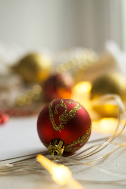 istock New Year red ball on abstract blurred background. Christmas concept. 1266835246