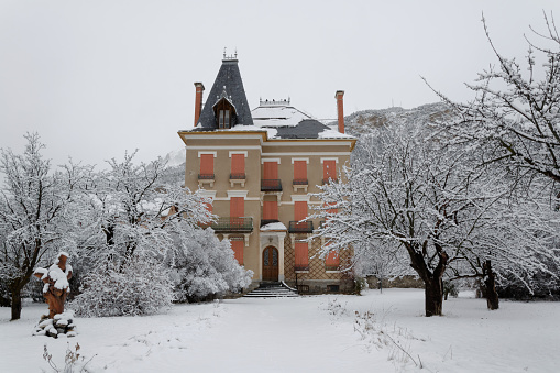 Jausiers, France, December 26, 2014: beautiful family home with orange shutters