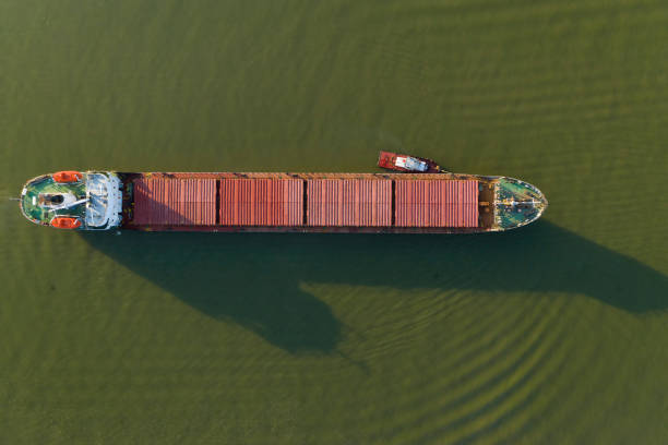 istock Commercial ship crossing the river. 1266846844