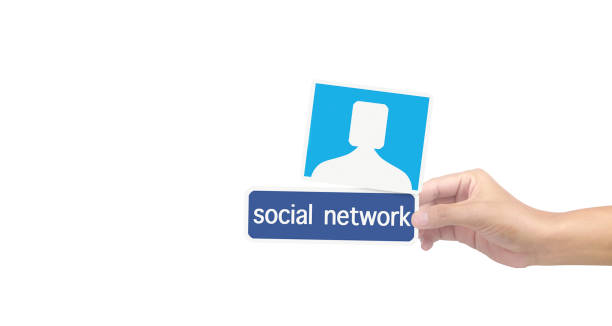 istock Hands holding social networking service  on paper 1266848141