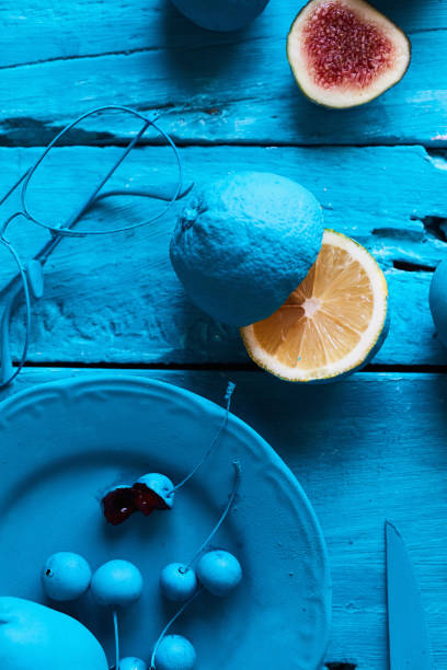 istock blue painted collection plate, fig, lemon, cherry 1266850057