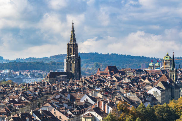 Stunning aerial view of Bern old town with Bern Minster (Münster) cathedral and Swiss Federal Palace (Bundeshaus), Stunning aerial view of Bern old town with Bern Minster (Münster) cathedral and Swiss Federal Palace (Bundeshaus), from Rosengarten on sunny autumn day, Switzerland bundeshaus stock pictures, royalty-free photos & images