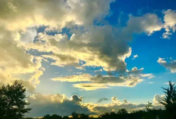 Clouds after a storm part to show blue sky