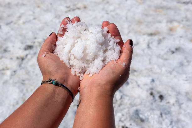 istock Handful of natural salt crystals. 1266859632