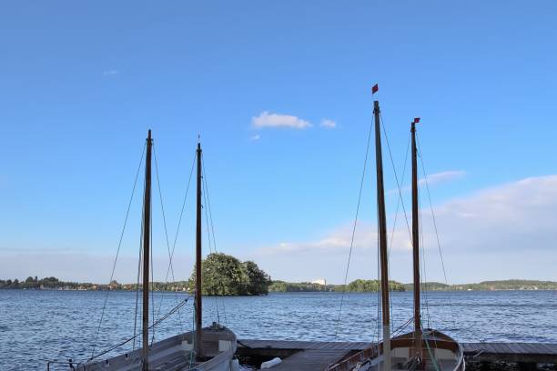 istock Beautiful landscape at a lake with a reflective water surface 1266860441