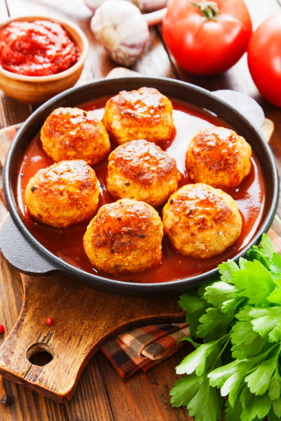 istock Meatballs in tomato sauce 1266868445