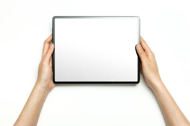 istock woman hand hold a smart pad(tablet pc) on the white background. 1266873700
