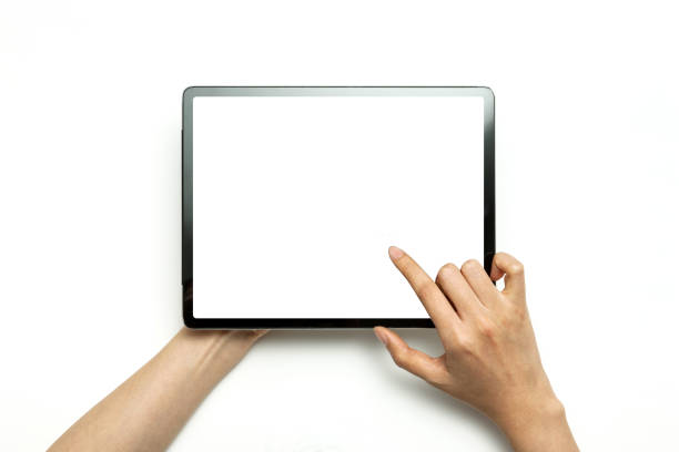 istock woman hand hold a smart pad(tablet pc) horizontal on the white background. 1266873708