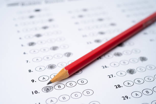 istock Answer sheets with Pencil drawing fill to select choice, education concept 1266874496