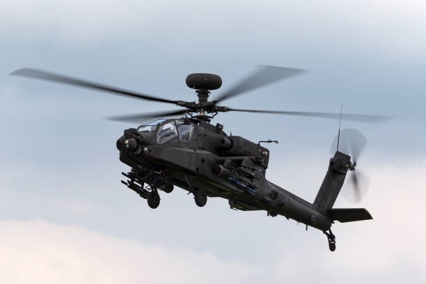 イギリス陸軍航空隊アグスタウェストランドアパッチah.1攻撃ヘリコプターは、rafワディントンを出発します。 - army air corps ストックフォトと画像