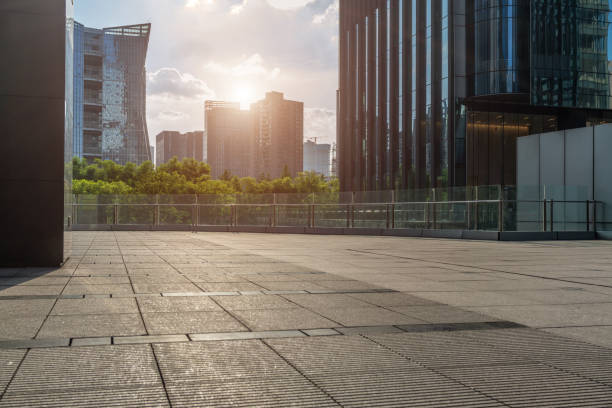 istock empty ground floor and modern office buildings  in downtown. 1266885366