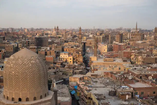 Photo of Elevated image from Bab Zuwayla of downtown Cairo with old ocher buildings