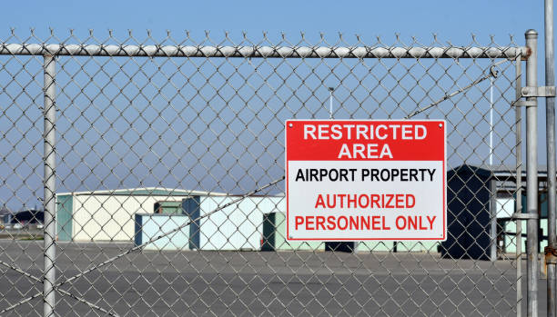 istock A restricted area sign near airport 1266892211