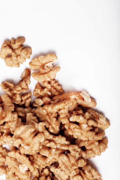 istock Walnut In Bowl Isolated On White Background. 1266893380