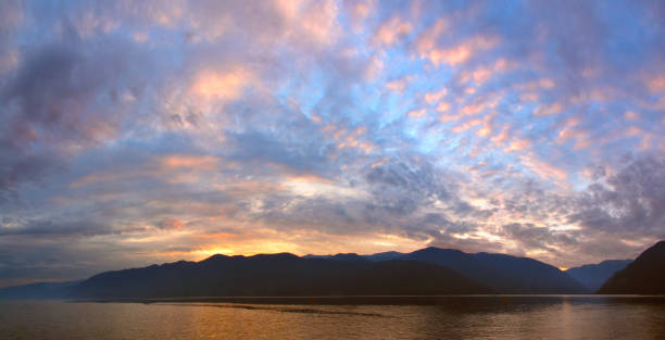 istock Sunset on mountain lake, beautiful sky 1266894692