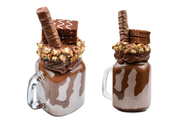 istock Chocolate extreme milkshake with brownie cake, chocolate paste and sweets. Crazy freakshake food trend. Copy space 1266896597
