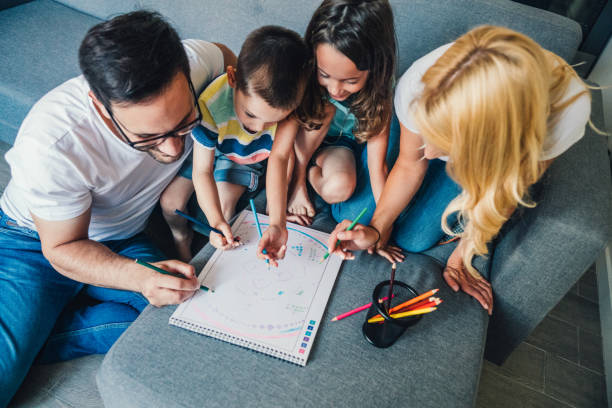istock Young happy family drawing 1266897357