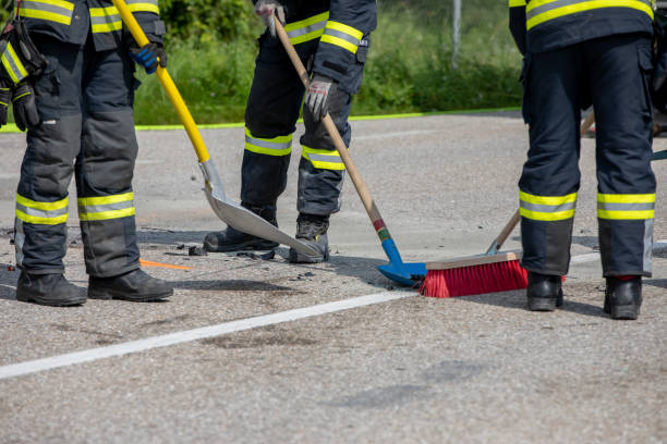 istock Firefighters cleaning the street after crash 1266899877