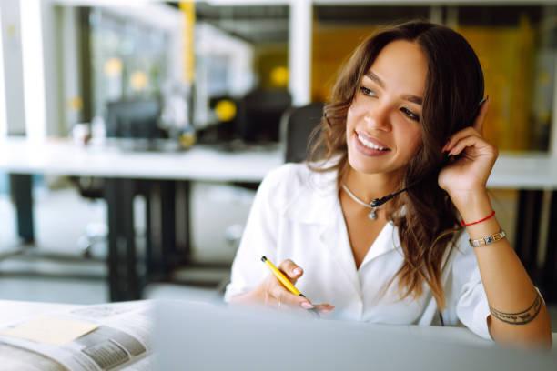 istock Young woman student wear wireless headphone study online. 1266900617