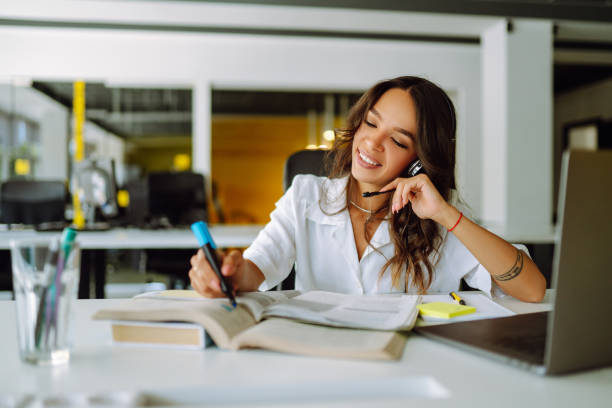 istock Young woman student wear wireless headphone study online. 1266900956