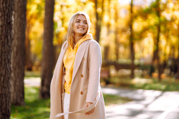 istock Beautiful Woman having fun in the forest. 1266902454