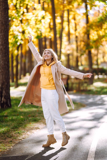 istock Beautiful Woman having fun in the forest. 1266902530